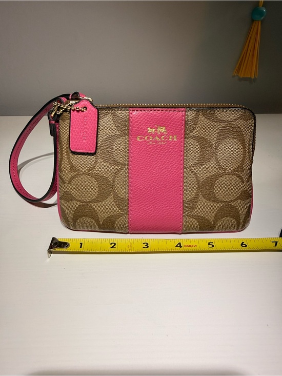 Coach Handbags - Coach Tan Signature Canvas Wristlet with Pink Leather Center Stripe